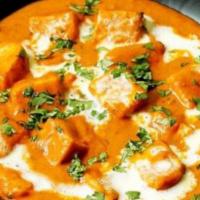 Paneer Butter Masala · Paneer cooked in tomato and creamy gravy.
