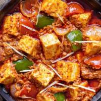 Kadai Paneer (Chef's Special) · Paneer cooked in spices, green peppers, onions and tomato gravy.