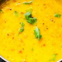 Dal Tadka (Chef's Special). · Yellow lentils cooked in cumin seeds, mustard and curry leaves.