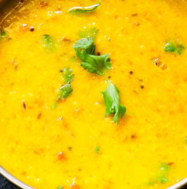 Dal Tadka (Chef's Special). · Yellow lentils cooked in cumin seeds, mustard and curry leaves.