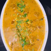Chicken Korma. · Chicken cooked in creamy sauce of nuts, coconut and tomato.