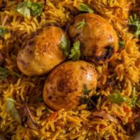 Egg Biryani. · Aromatic Basmati rice with boiled eggs and spices steamed together.