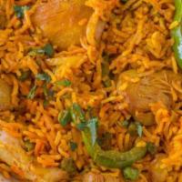 Chicken Boneless biryani. · Aromatic Basmati rice with boneless chicken pieces and spices steamed together.