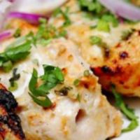 Zafrani Kabab. · Boneless Chicken breast pieces marinated in saffron and mild spices and grilled in tandoor o...