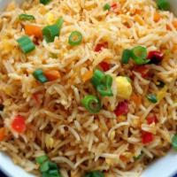 Egg Fried Rice. · Rice tossed with egg and mild spices.