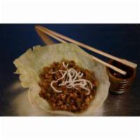 Chicken Lettuce Wraps · Wok tossed minced chicken, water chestnuts, shiitake mushroom and celery served in 4 cool le...