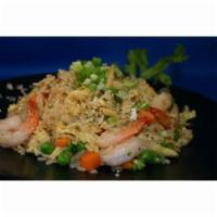 Fried Rice · Savory fried rice tossed with farm fresh eggs, diced onions, peas and carrots with your choi...