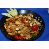 Cashew · Sichuan chili sauce, sweet soy, garlic, and black vinegar, tossed with cashews, peanuts, zuc...