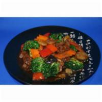 Garlic Broccoli · Broccoli, red bell peppers, shiitake mushrooms, carrots, and water chestnuts wok seared in o...