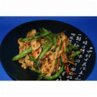 Sichuan Green Bean · Fresh green beans, julienned carrots and dry black beans tossed in our soy chili sauce.