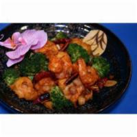 Spicy Shrimp · This dish is addictively hot! Battered shrimp tossed with garlic, whole chili pods, sliced g...