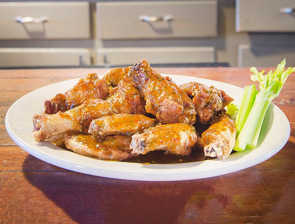 Chicken Wings (Traditional) · Crispy, juicy all-natural wings fried to perfection and tossed in any of our signature sauces. Available either traditional or boneless and served with celery and ranch or bleu cheese.