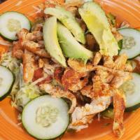 Grilled Chicken Avocado Salad · Grilled chicken, lettuce, tomatoes, cucumber, onions, peppers, cheese, and fresh-cut avocado...