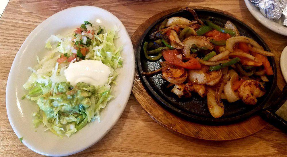 Shrimp Fajitas · 12 pieces delicious shrimp sauteed with onions, tomatoes, and peppers.