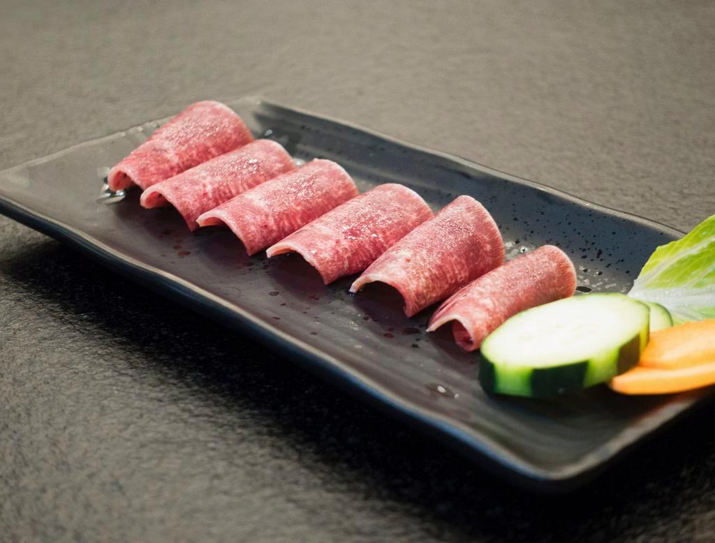 Beef Tongue (1/2 lb) · Thinly sliced beef tongue. Also good for hot pot! 