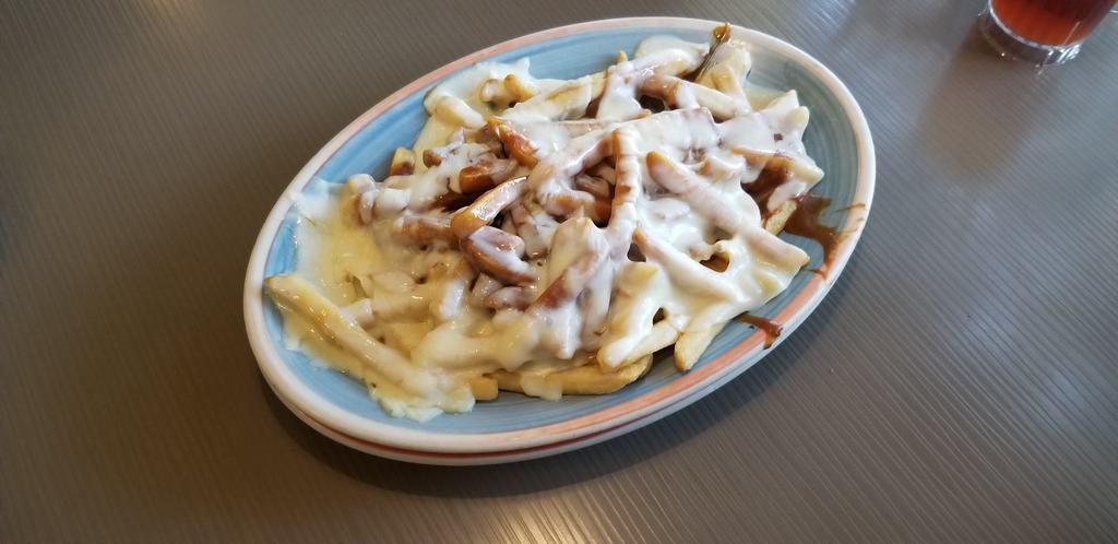 Disco French Fries · With melted mozzarella cheese and brown gravy.