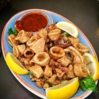 Fried Calamari · Golden fried calamari, served with zesty marinara sauce.