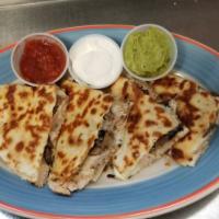 Quesadilla · Two flour tortillas with grilled chicken and shredded mozzarella cheese, sauteed mushrooms, ...