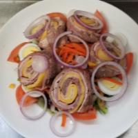 Chef Salad · sliced roast beef, turkey, ham, Swiss, cheddar cheese, cucumbers, tomatoes and hard boiled e...