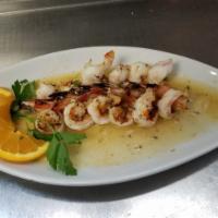 Sauteed Shrimp Scampi · Ocean shrimp sauteed with garlic in lemon, butter and white wine. Served with potato, vegeta...