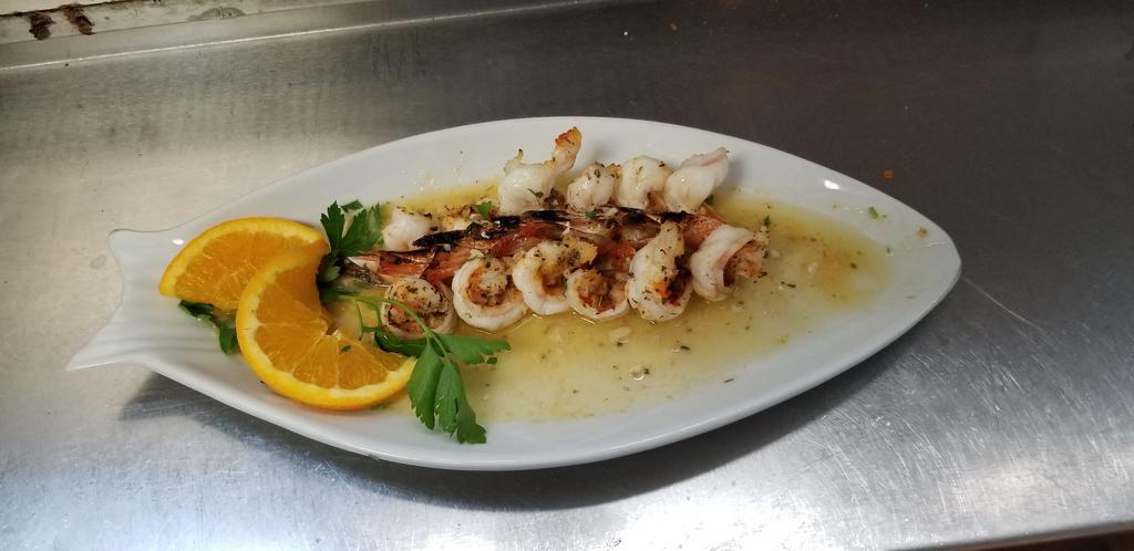 Sauteed Shrimp Scampi · Ocean shrimp sauteed with garlic in lemon, butter and white wine. Served with potato, vegetable, and cup of soup or mixed green salad. 