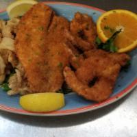 Neptune Fish Platter · Jumbo shrimp, calamari and tilapia. Lightly breaded and fried golden.