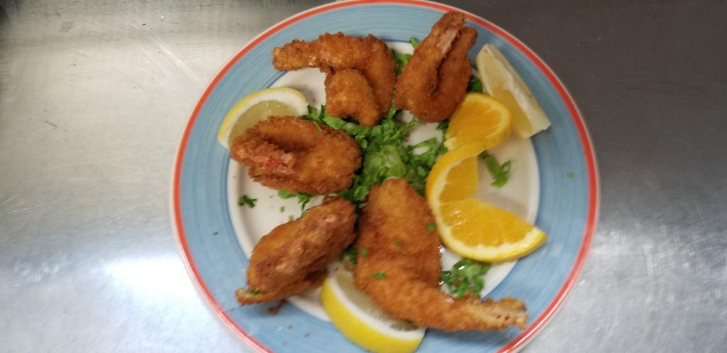 Fried Shrimp · Shrimp breaded with Japanese bread crumbs and fried golden brown. Served with potato, vegetable, and cup of soup or mixed green salad. 