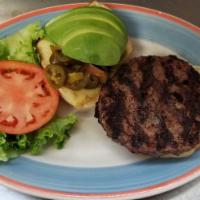 Mexican Burger · Served with Haas avocado, jalapenos, pepper jack cheese and tomato salsa. Deluxe is served f...