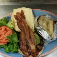 California Burger · Served with Haas avocado, bacon, Swiss cheese and ranch dressing. Deluxe is served french fr...
