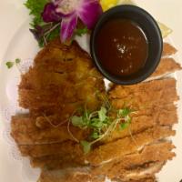Pork Katsu Cutlet · Served with miso soup or salad and white or brown rice.