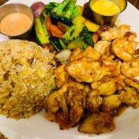 Shrimp and Chicken Hibachi · Japanese style stir fried with garlic and butter. Served with soup, green salad and egg frie...