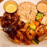 Shrimp and Steak Hibachi · Japanese style stir fried with garlic and butter. Served with soup, green salad and egg frie...