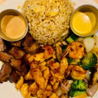 Steak and Chicken Hibachi · Japanese style stir fried with garlic and butter. Served with soup, green salad and egg frie...