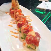 Oki Roll · Shrimp tempura avocado topped with spicy tuna, tobiko and served with scallion and spicy mayo.