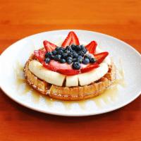 Waffle a la Yiayia's Greek Yogurt · Waffle topped with Greek yogurt, blueberries, strawberries, bananas and drizzled with honey....