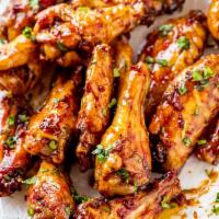 Garlic Wings Meal · 4 whole pieces garlic chicken wings. Served with fried rice, french fries, brown rice or whi...