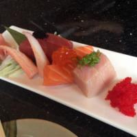Sushi Regular · Eight pieces of nigiri sushi and six pieces of tuna roll.