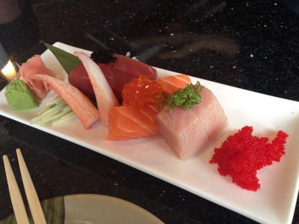 Sushi Regular · Eight pieces of nigiri sushi and six pieces of tuna roll.