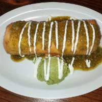 Beef Birria Chimichanga · rice, beans cheese and beef birria, topped with salsa verde, crema and guac