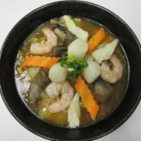 Seafood Ramen  · Shoyu base in soup with shrimp, scallop, squid, mushroom, carrot, ground onion, cabbage, and...