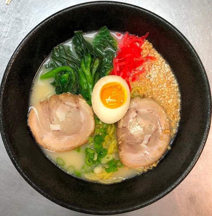 Tonkotsu Ramen  · Rich and creamy pork base in soup with char siu, choy sum, green onion, chopped garlic, and soft egg. 