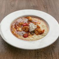 Shrimp and Grits Lunch · Creamy cheddar grits, caramelized onion, peppers, creole sauce, bacon bits, corn and sour cr...