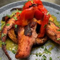 Charred Octopus · Fingerlings, chorizo, paprika, roasted red pepper and chimichurri. 