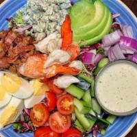 Chilled Shrimp Cobb Salad · Egg, blue cheese, avocado, bacon, little tomatoes, red onion, cheddar, ranch. 