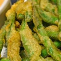 Tempura Green Beens · Lightly fried green beans. Served with a spicy dipping sauce.