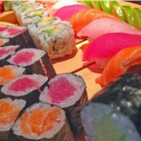 Sushi Party Tray A · Salmon roll, tuna roll, kappa maki, California roll, and 8 pieces of nigiri. Chef's choice.