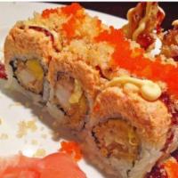 Angel Roll · Shrimp tempura, and mango. Topped with cooked salmon, and mayo. 