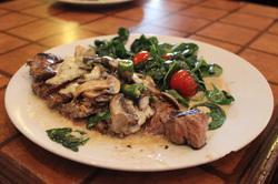 Cantina Steak · New York strip cooked to order, topped with mushroom cheese cream sauce and jalapeno slices. Served with sauteed garlic spinach and a side of rice.