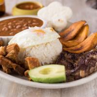 Bandeja Paisa Especial · Beef steak, egg pork rinds, arepa, white rice and beans, and sweet plantains.