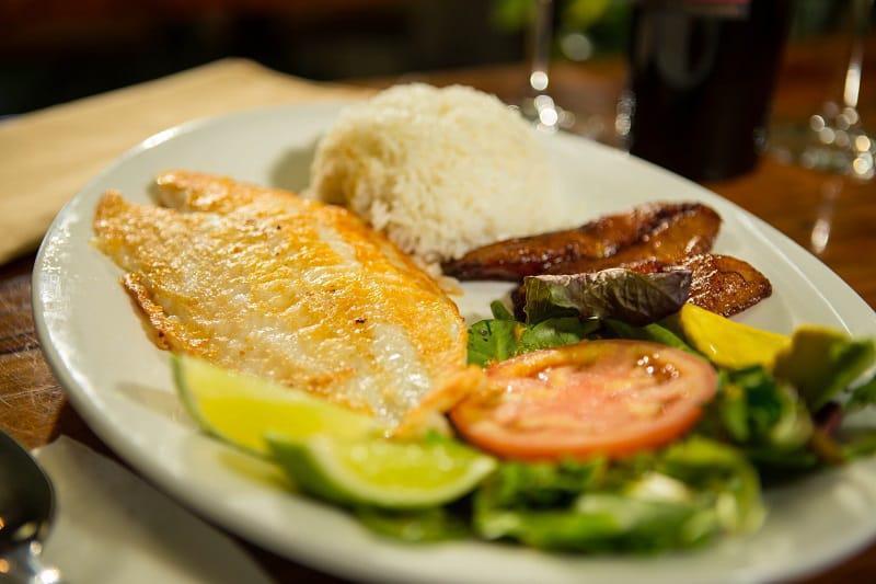 Filete de Pescado a la Plancha · Grilled fish. Grilled fish fillet with rice, salad, and sweet plantains.